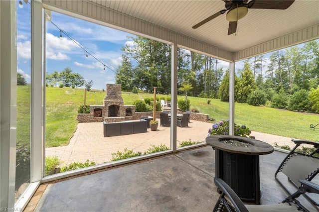 7823 Gatsby Pl, Greensboro, NC 27455 - view of patio featuring an outdoor stone fireplace and a ceiling fan