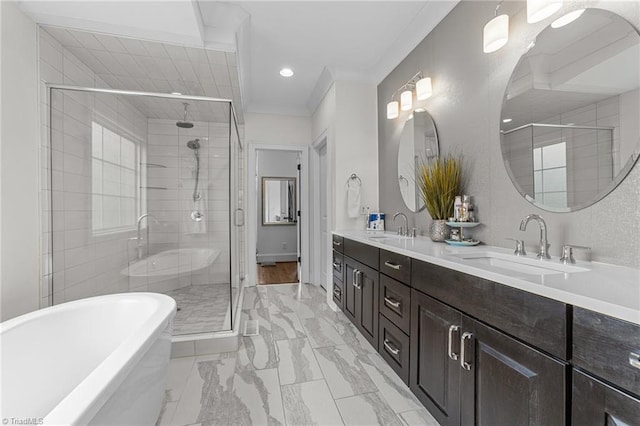 7823 Gatsby Pl, Greensboro, NC 27455 - bathroom with a stall shower, double vanity, a soaking tub, marble look tiles, and recessed lighting