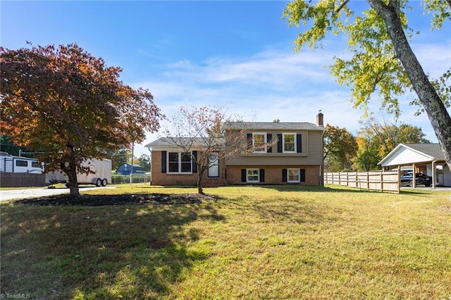 view of front of home featuring a front lawn