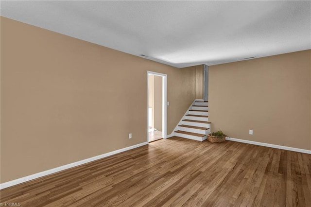 unfurnished room featuring wood-type flooring