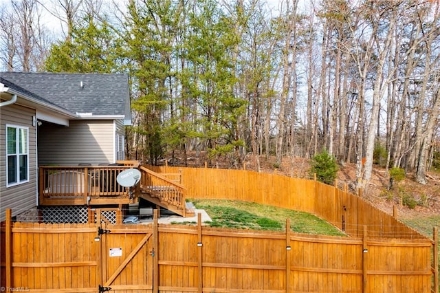 wooden deck with fence and a gate