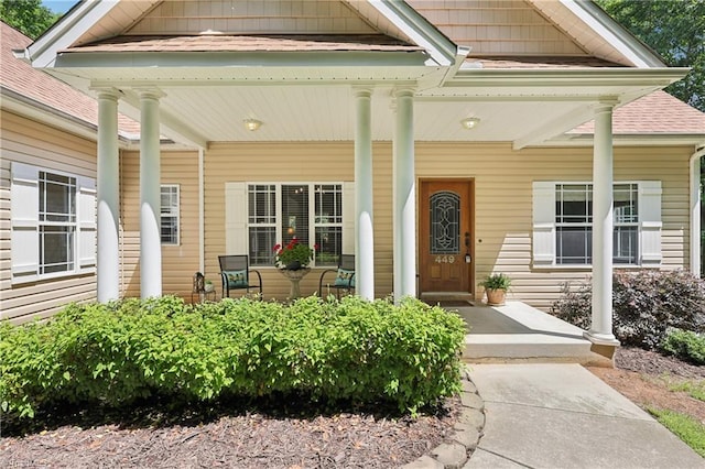 449 Wallburg High Point Rd, Winston-Salem, NC 27107 - doorway to property with covered porch and a shingled roof