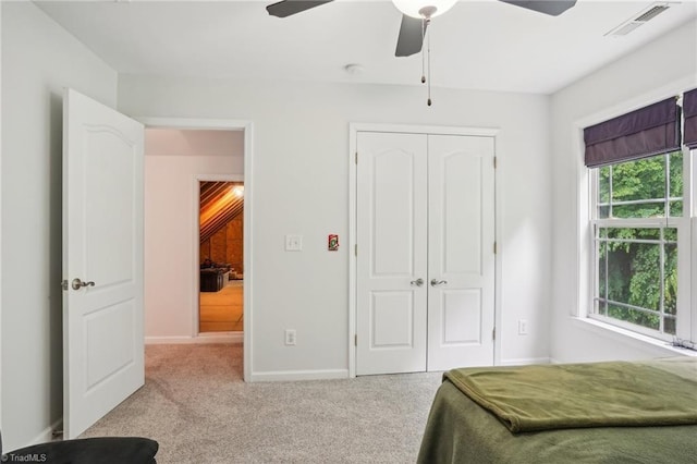 449 Wallburg High Point Rd, Winston-Salem, NC 27107 - carpeted bedroom with a closet, baseboards, and ceiling fan