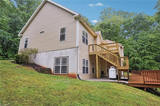 449 Wallburg High Point Rd, Winston-Salem, NC 27107 - rear view of house featuring a deck, a yard, and a patio area