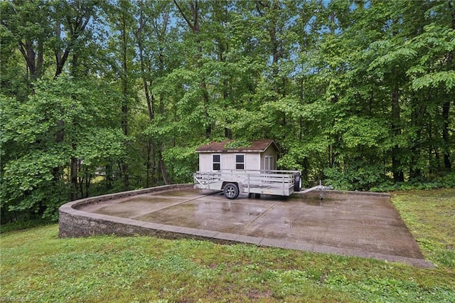 449 Wallburg High Point Rd, Winston-Salem, NC 27107 - view of patio / terrace with a forest view and an outbuilding