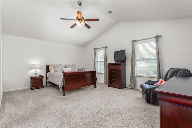bedroom with carpet floors, visible vents, baseboards, ceiling fan, and lofted ceiling