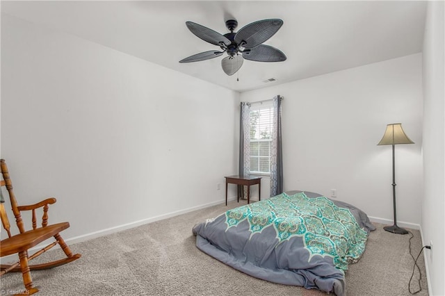 bedroom featuring baseboards, visible vents, ceiling fan, and carpet floors