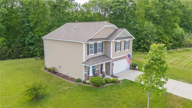 view of side of home featuring a lawn, driveway, a shingled roof, and a garage