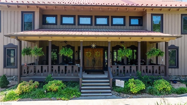 view of exterior entry featuring a porch