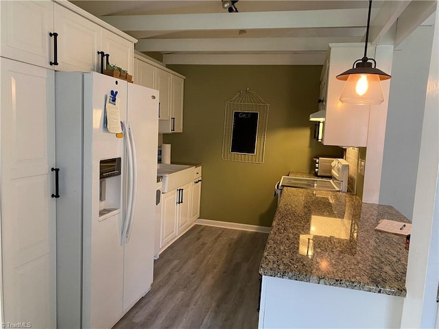 kitchen with white refrigerator with ice dispenser, dark hardwood / wood-style flooring, white cabinetry, pendant lighting, and beam ceiling