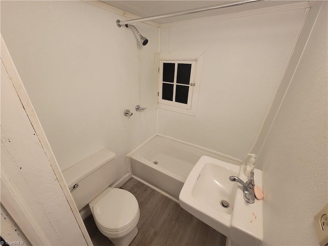 bathroom featuring sink, hardwood / wood-style flooring, and toilet