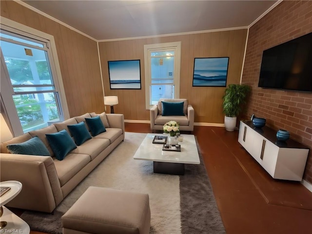 living room with crown molding, brick wall, and hardwood / wood-style flooring