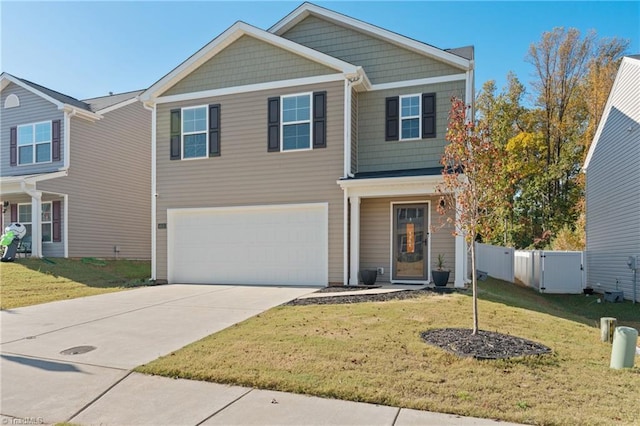 view of front of home featuring a garage and a front lawn