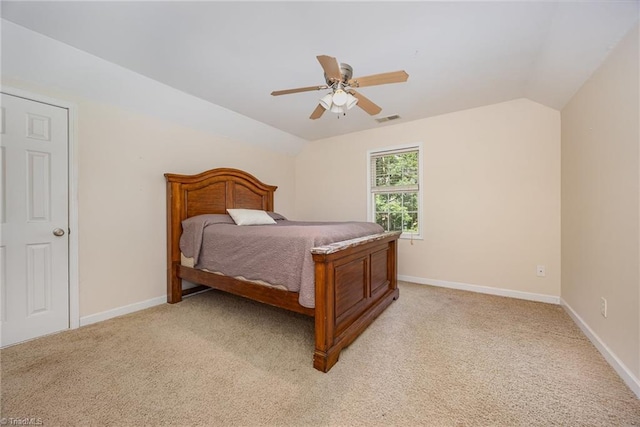 1329 Chickadee Cir, Asheboro, NC 27203 - bedroom featuring light colored carpet, lofted ceiling, ceiling fan, and baseboards