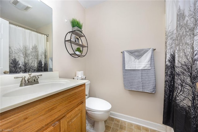 1329 Chickadee Cir, Asheboro, NC 27203 - full bathroom featuring baseboards, vanity, toilet, and a shower with shower curtain