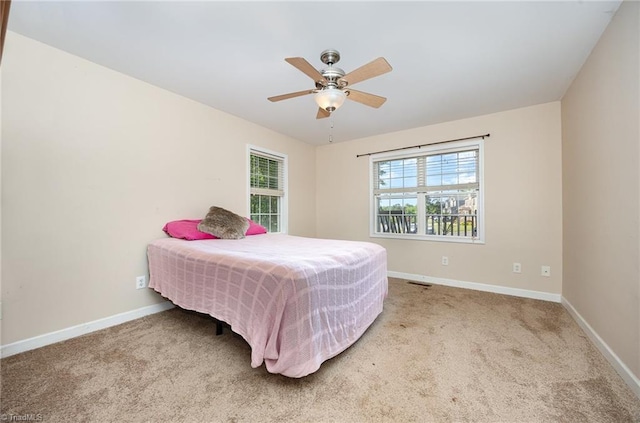 1329 Chickadee Cir, Asheboro, NC 27203 - carpeted bedroom with baseboards and a ceiling fan