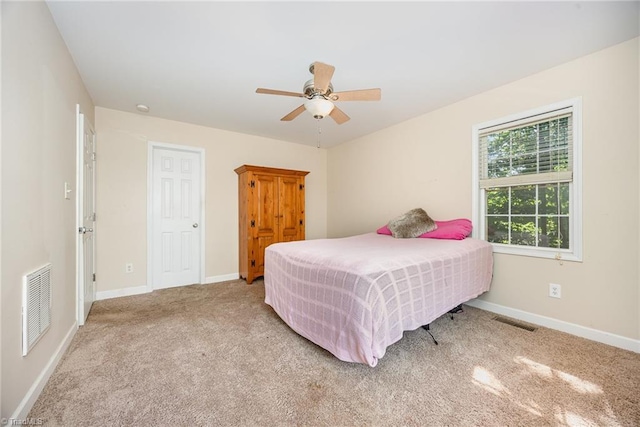 1329 Chickadee Cir, Asheboro, NC 27203 - bedroom featuring carpet flooring, baseboards, and a ceiling fan