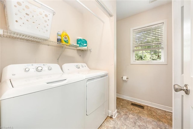 1329 Chickadee Cir, Asheboro, NC 27203 - laundry room featuring washing machine and dryer and baseboards
