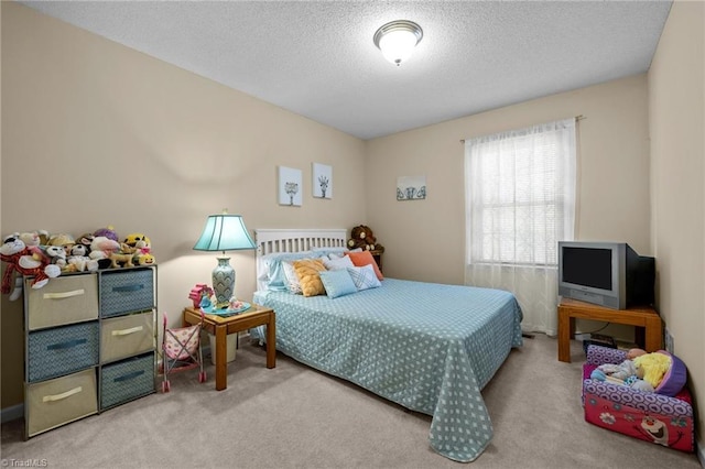 3100 Coachmans Way, Durham, NC 27705 - carpeted bedroom featuring a textured ceiling