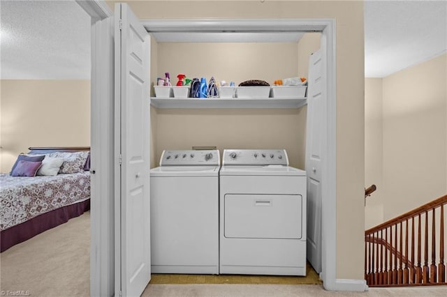 3100 Coachmans Way, Durham, NC 27705 - clothes washing area featuring washing machine and clothes dryer, laundry area, and light carpet