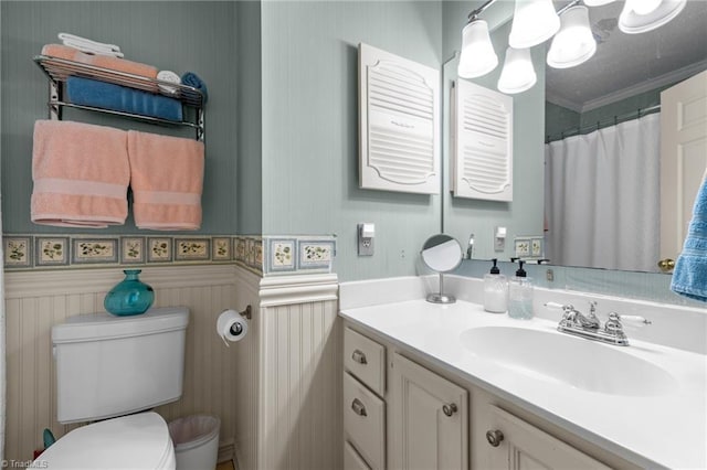 3100 Coachmans Way, Durham, NC 27705 - full bath with wallpapered walls, toilet, vanity, and a wainscoted wall