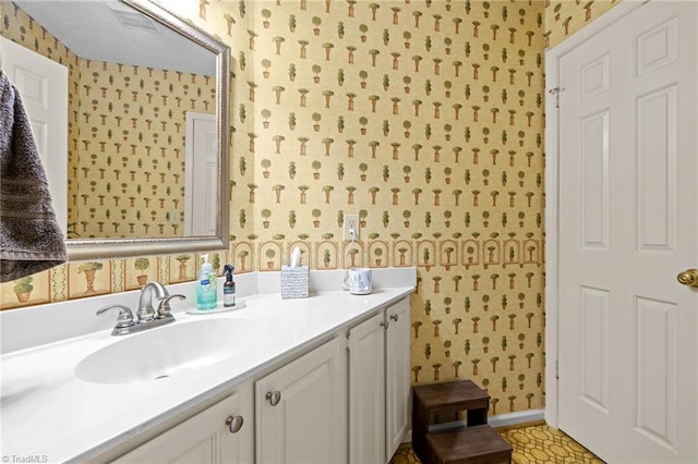 3100 Coachmans Way, Durham, NC 27705 - bathroom featuring wallpapered walls, baseboards, and vanity