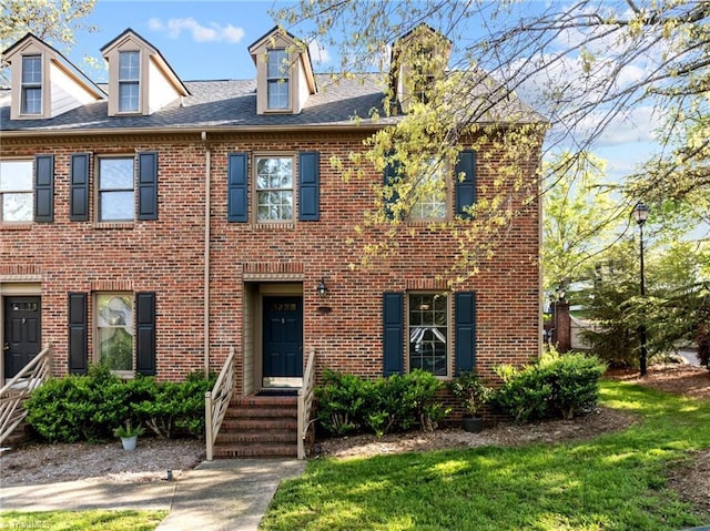 3100 Coachmans Way, Durham, NC 27705 - view of front facade featuring a front lawn and brick siding