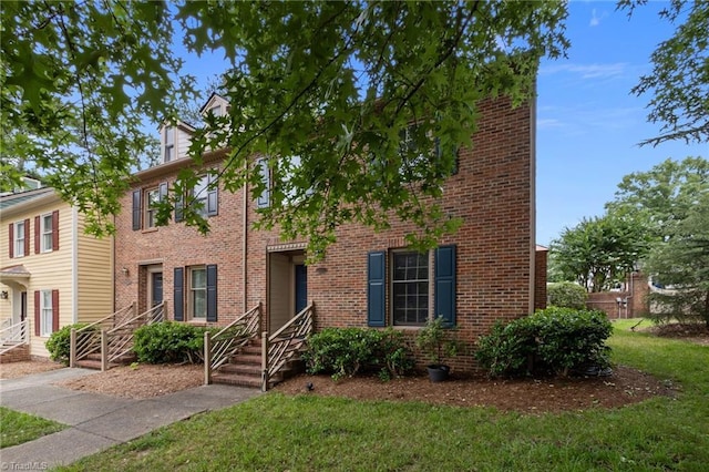 3100 Coachmans Way, Durham, NC 27705 - view of front facade with a front lawn and brick siding