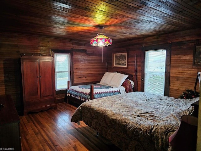 4793 Cheek Mountain Rd, Laurel Springs, NC 28644 - bedroom featuring wooden walls, dark wood-style flooring, and wooden ceiling