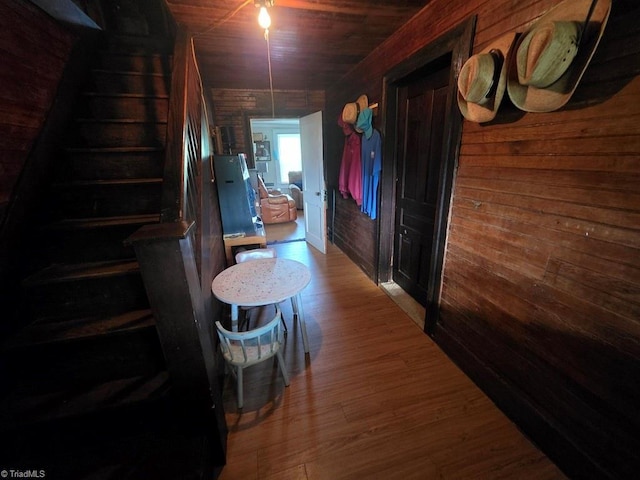 4793 Cheek Mountain Rd, Laurel Springs, NC 28644 - corridor with wood walls, wood finished floors, stairs, and wooden ceiling