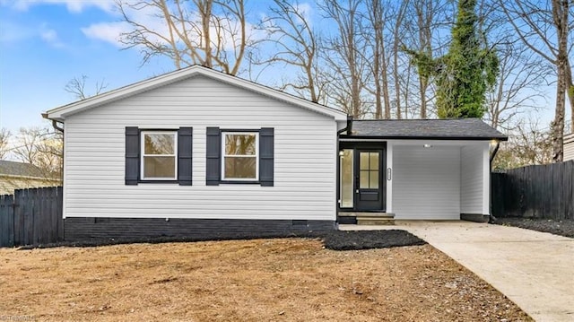 view of front of property with a carport