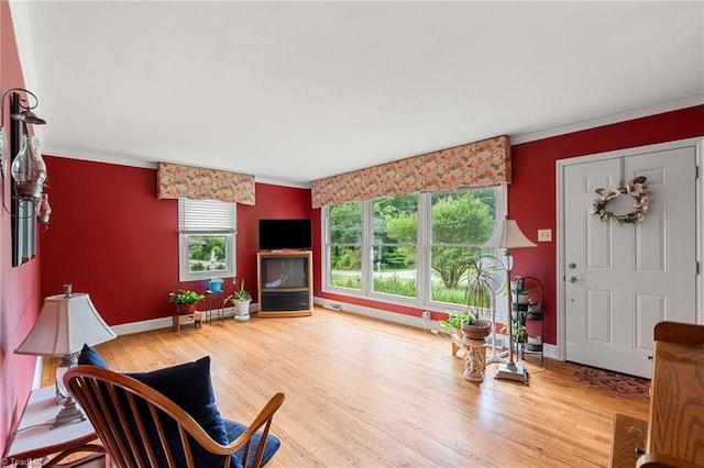 2505 Roland Rd, Greensboro, NC 27407 - living area featuring ornamental molding and wood finished floors