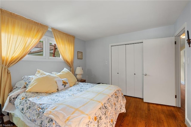 2505 Roland Rd, Greensboro, NC 27407 - bedroom featuring wood finished floors and a closet