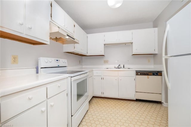 4330 Edith Ln Unit A, Greensboro, NC 27409 - kitchen featuring white appliances, under cabinet range hood, a sink, light countertops, and white cabinets