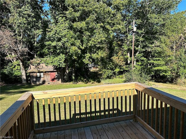 deck featuring a yard