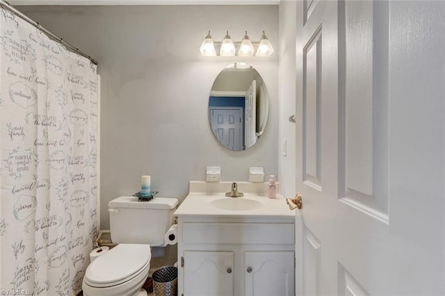 full bath featuring curtained shower, vanity, and toilet