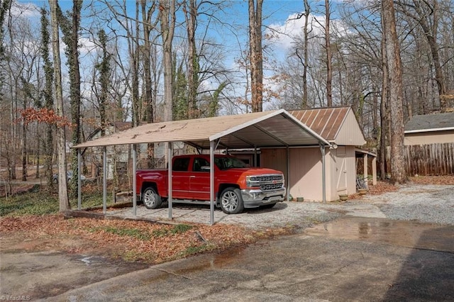 view of vehicle parking featuring a detached carport