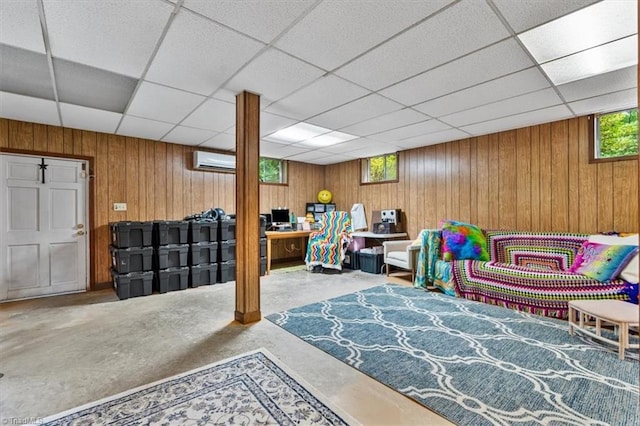 4515 Gilmore Dr, Liberty, NC 27298 - below grade area featuring wooden walls, a paneled ceiling, an AC wall unit, and carpet flooring
