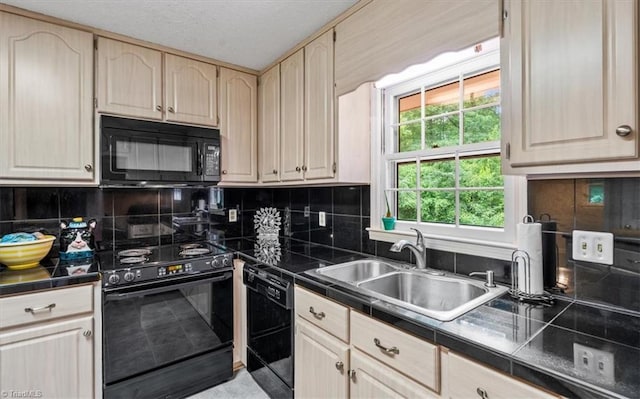4515 Gilmore Dr, Liberty, NC 27298 - kitchen with black appliances, a sink, decorative backsplash, and light brown cabinetry