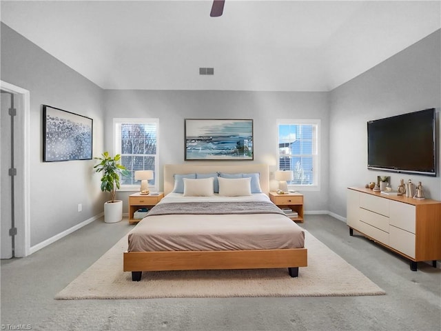 bedroom featuring light carpet and ceiling fan