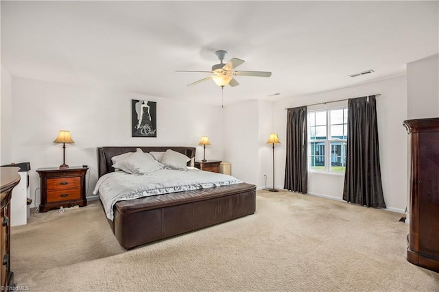 carpeted bedroom featuring ceiling fan