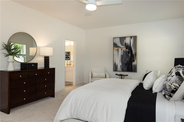 6021 Crestridge Ln Unit 1003, Winston-Salem, NC 27105 - bedroom featuring light colored carpet, a ceiling fan, and connected bathroom