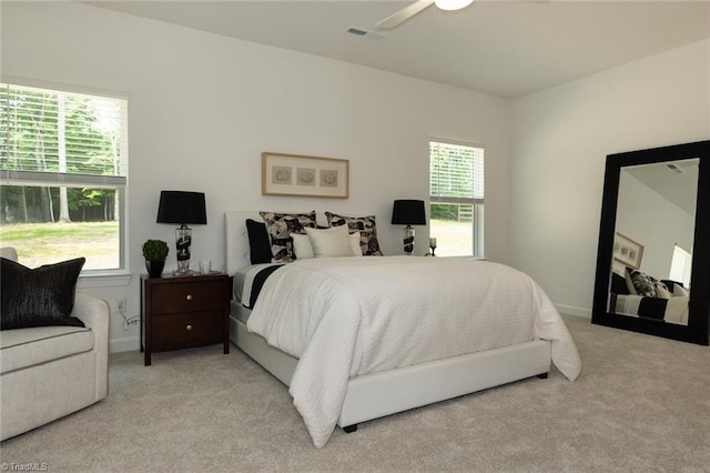 6021 Crestridge Ln Unit 1003, Winston-Salem, NC 27105 - bedroom with light colored carpet and ceiling fan