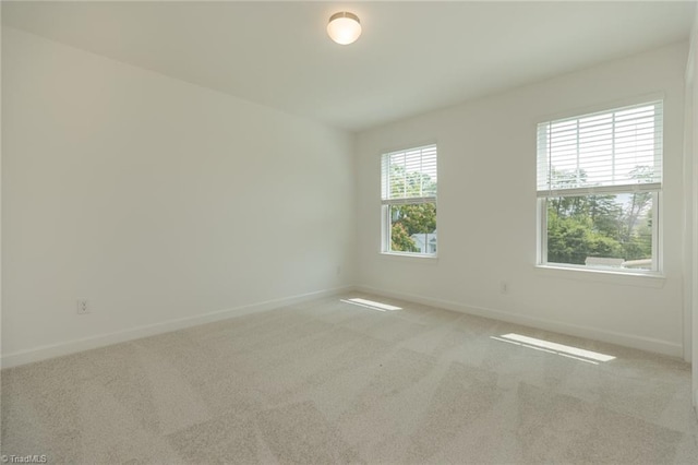 6021 Crestridge Ln Unit 1003, Winston-Salem, NC 27105 - spare room featuring baseboards and carpet