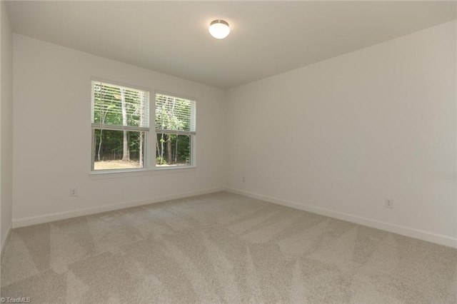 6021 Crestridge Ln Unit 1003, Winston-Salem, NC 27105 - unfurnished room featuring light carpet and baseboards