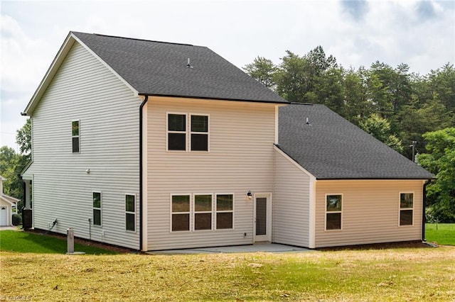 6021 Crestridge Ln Unit 1003, Winston-Salem, NC 27105 - rear view of house featuring a lawn, a patio, and a shingled roof