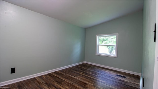1176 Arbor Grove Church Rd, Millers Creek, NC 28697 - empty room featuring lofted ceiling and dark wood-style floors