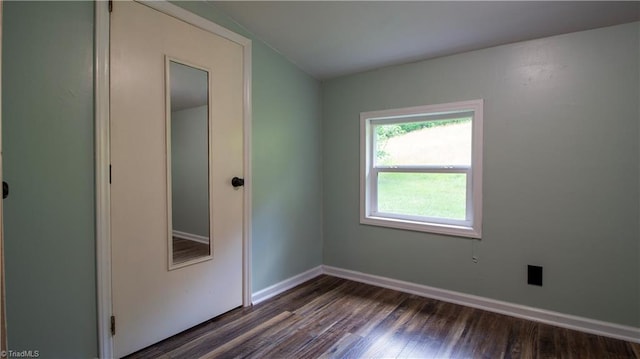 1176 Arbor Grove Church Rd, Millers Creek, NC 28697 - unfurnished bedroom featuring dark wood-style floors and baseboards