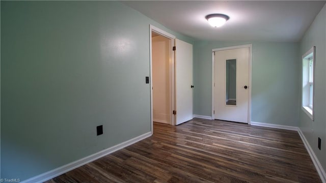 1176 Arbor Grove Church Rd, Millers Creek, NC 28697 - spare room with dark wood-type flooring and baseboards