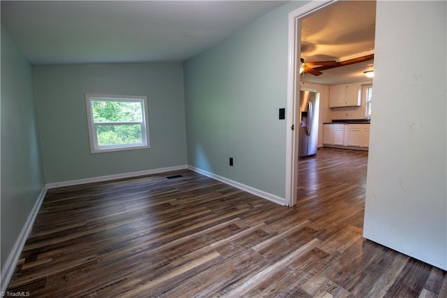 1176 Arbor Grove Church Rd, Millers Creek, NC 28697 - spare room featuring plenty of natural light, dark wood-style floors, and a ceiling fan